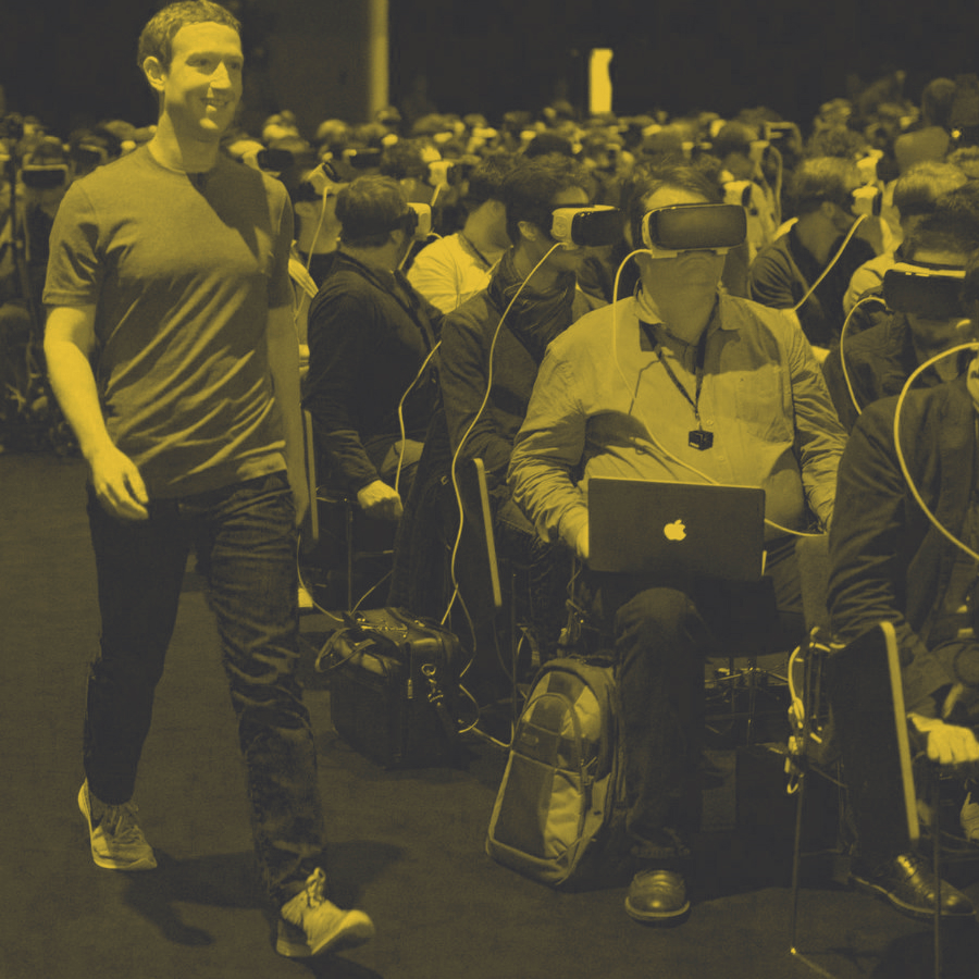 Mark Zucherberg crosses a conference hall in which everyone but him wear an Oculus VR HMD